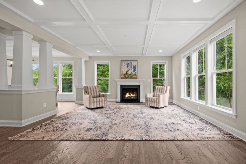 Family room with coffered ceiling and fireplace