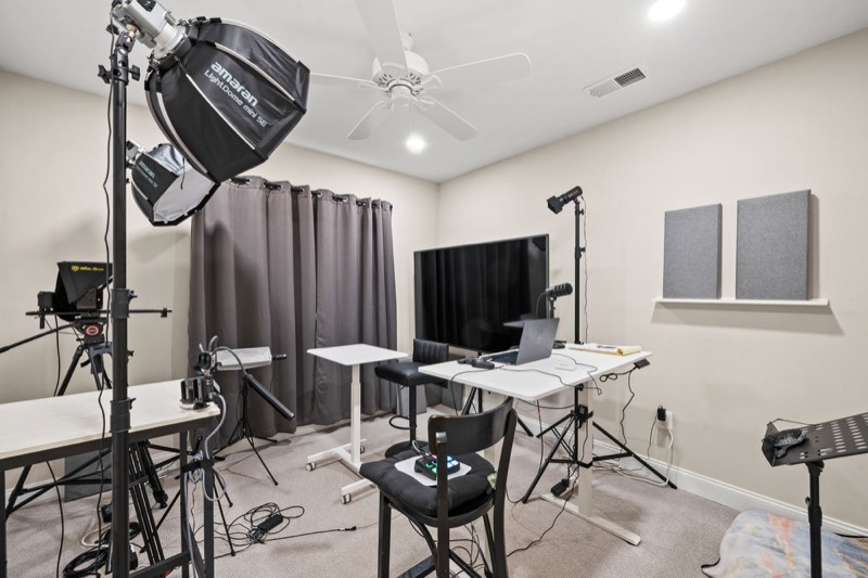 Lower-level bedroom, currently a media studio